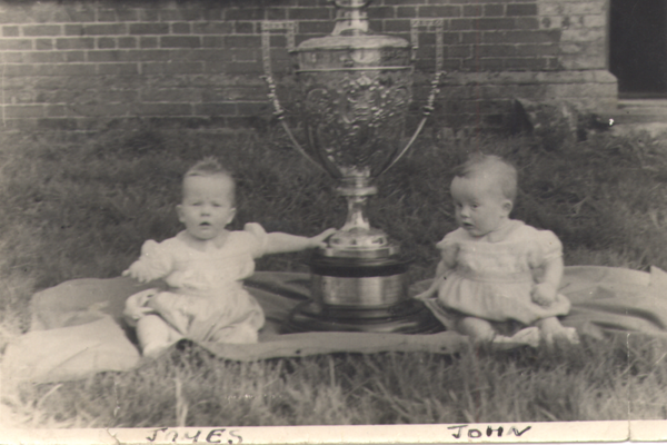 Jimmy Clabburn won the Gold Cup in 1946 sailing 3 Purple Emperor. The Clabburn twins were photographed beside the trophy. James (left) was commodore of the Norfolk Broads Yacht Club last year.